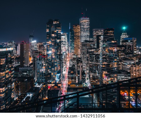 Toronto Financial District City Skyline Skyscrapers with Modern and Historic Building Construction and Development Views at Night