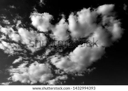 Monochrome Picture of Sky with Clouds as abstract Background or Texture