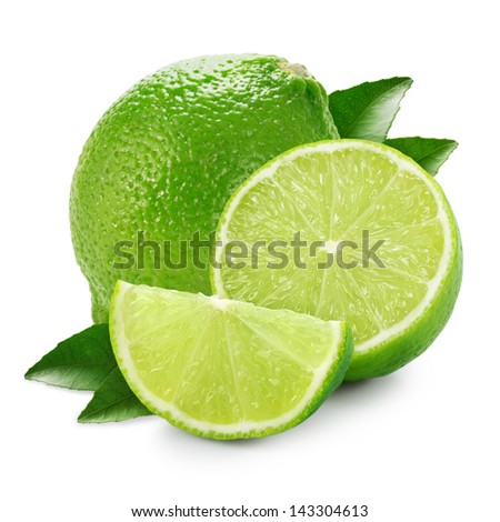 Limes with slices and leaves isolated on white background Royalty-Free Stock Photo #143304613