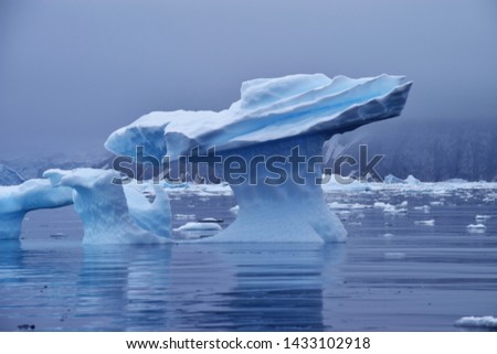 Iceberg sculpture in the waters of Antarctica
