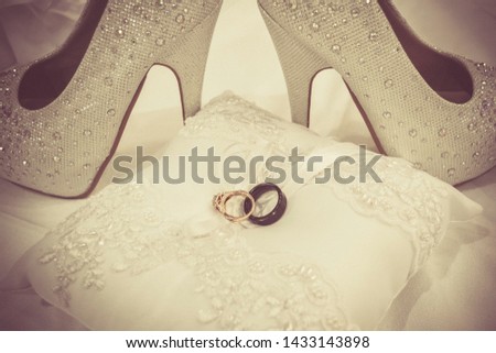 Wedding pair of shoes and rings