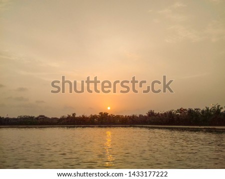 Beautiful sunset view with reflection in the lake water