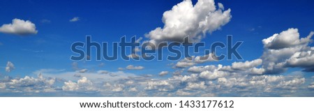 background of blue sky accompanied by beautiful and extreme clouds