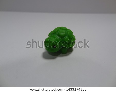 rubber turtle in white isolated backround