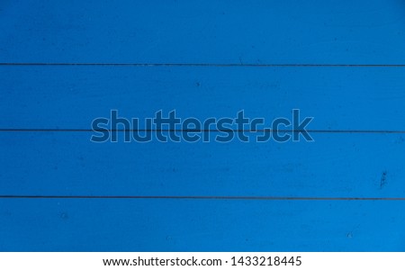 The wooden flooring in blue color