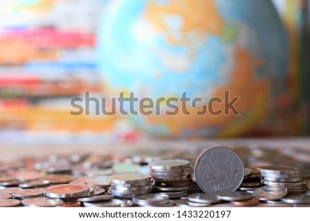 Close-up of many Thai coins on the floor selective focus and shallow depth of field