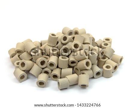 Ceramic filter material for aquaria, isolated against white background Royalty-Free Stock Photo #1433224766