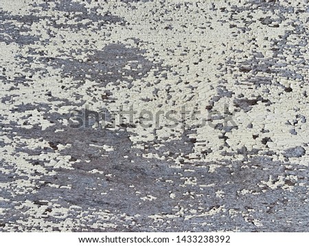 Pattern of paint peel off on old color with dirty, texture of grunge wooden board. Scratched layer on surface of wooden board. Abstract of rough for background.
