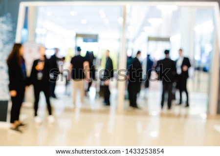 blurry of people walking to security check gateway before entering the event. persons passing through gateway cabin for access identification isometric composition.