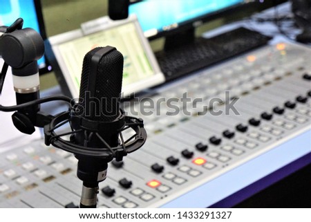 Close-up  of the microphone in the broadcast room of the radio station.
