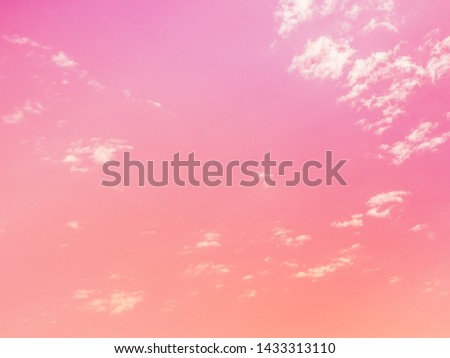 The pink sky is partly cloudy, suitable for background.