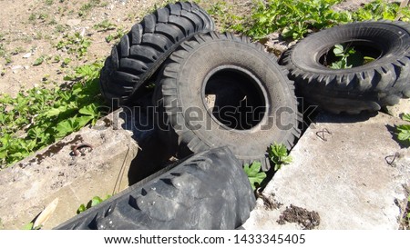 bunch of old truck tires on the street