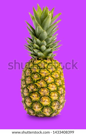 Isolated pineapple on purple background