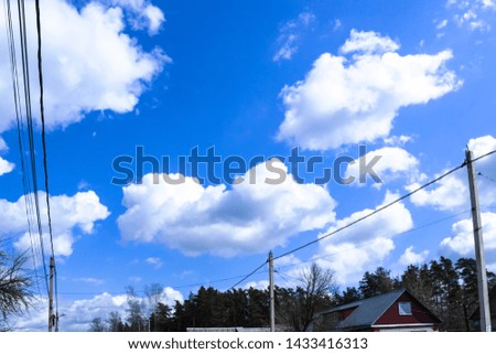pictured in the photo Clouds and blue sky background with copy space