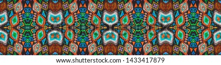 Ikat art. African seamless pattern. Cherokee print. Navajo texture. Indian motif. Indian native ornament. Boho endless texture. Black, cyan, pink, green, gold ikat art.
