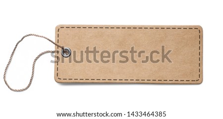 Blank old paper label or cloth tag with round corners isolated