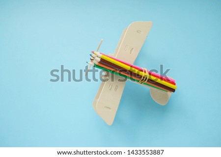 small toy plane with autumn leaf. Autumn concept