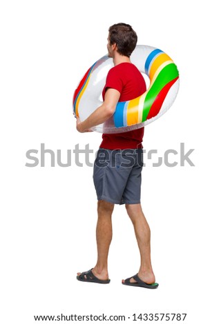 Side view of man with a beach bag that goes to side. A young traveler goes swimming. backside view of person. Rear view people collection. Isolated over white background. 