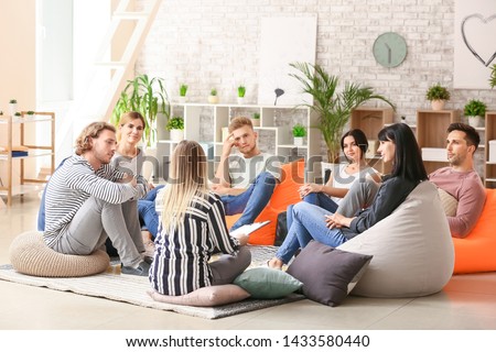 People at group therapy session Royalty-Free Stock Photo #1433580440