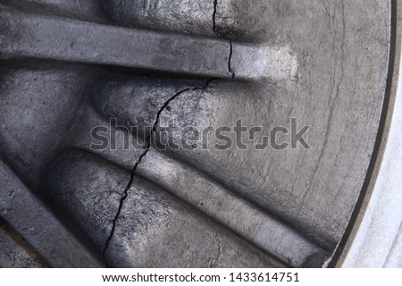 Cracking of ASTM B26 Gr.355 cast aluminum compressor piston. Several casting defects noted. fracture surfaces and micostructure. Royalty-Free Stock Photo #1433614751