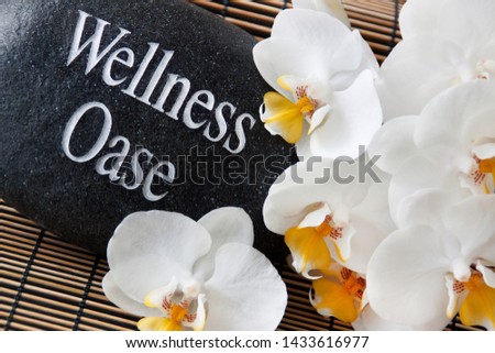 German Wellness Oasis and white orchids