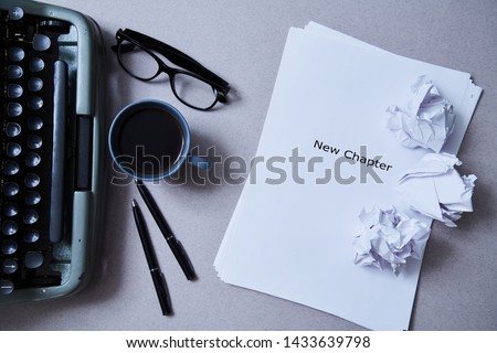 Literature, author and writer, writing and journalism concept: typewriter, cup of coffee and glasses and a paper Royalty-Free Stock Photo #1433639798