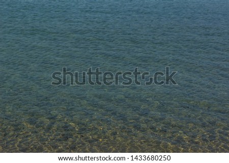 calming wavy water surface background 