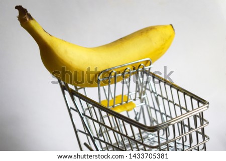 shopping cart only with a banana Royalty-Free Stock Photo #1433705381