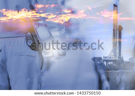 Oil field supervisor, operator or technician is holding safety helmet, preparing to work in drilling operation. Challenge working and safety concept with double exposure photo merge, background. 