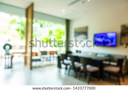 Abstract blur and defocused buffet restaurant and coffee shop cafe interior for background