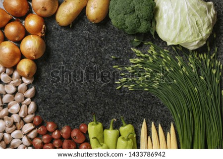 Healthy food. Vegetables on a black background. Top view. Copy space.