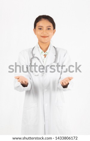 closeup portrait on Asian medicine doctor woman isolated white background.girl wear white gown coat and stethoscope