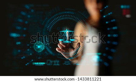 Legal advice technology service concept with businesswon hand working with modern Ui computer.