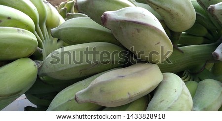 Green banana in the market