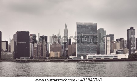 Retro toned panoramic view of New York City skyline, USA.