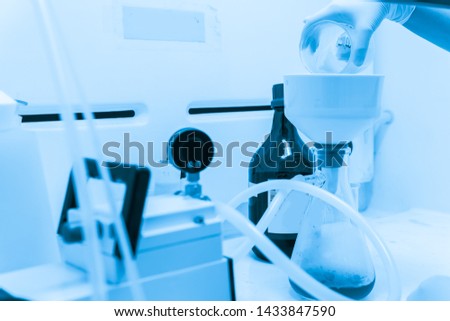 Asian scientist working in the lab,Experiment for customer,Using the formula, the physics and chemistry to calculate the value of the experiment,Thailand people