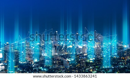 5G network digital hologram and internet of things on city background.5G network wireless systems. Royalty-Free Stock Photo #1433863241