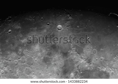 Astronomical photograph of the moon. Photo of the moon with high magnification. Moon surface with craters.