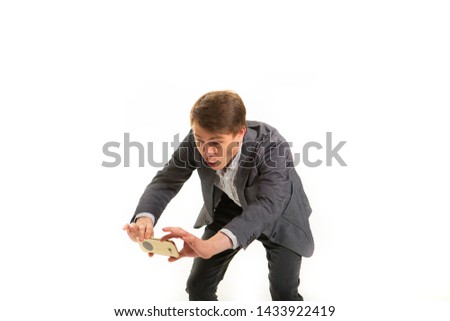 Funny man in a jacket, on a white background. Smart guy with a funny facial expression. Busy businessman humor makes selfie