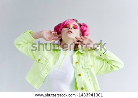 woman in green jacket relax beauty fashion