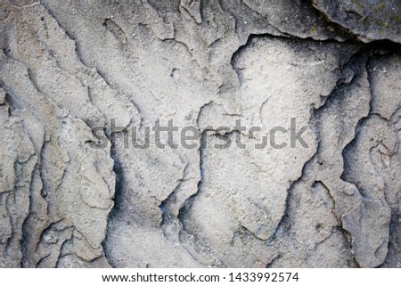 Abstract texture of stone wall of light gray and dark gray colors Royalty-Free Stock Photo #1433992574