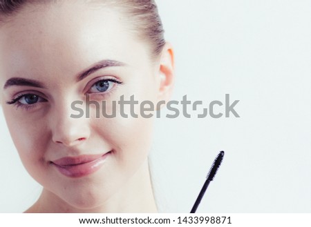 Mascara eyes woman natural face closeup 