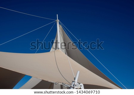 Sailing boats and a blue sky backdrop