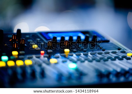 sound check for concert, mixer control, music engineer, backstage 
