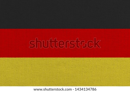 Germany fabric flag. Patriotic background. National flag of Germany