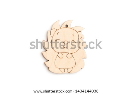 Christmas decoration on the Christmas tree of plywood in the form of hedgehog. Isolated on white background. Top view.