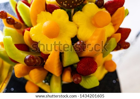 Edible Fruit basket arrangement with a variety of fruits Royalty-Free Stock Photo #1434201605