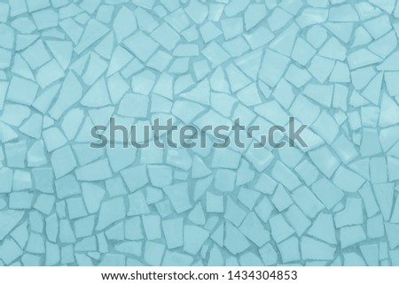 Broken tiles mosaic seamless pattern. Blue tile real wall high resolution real photo or brick seamless with texture interior background. Abstract wallpaper irregular in bathroom.