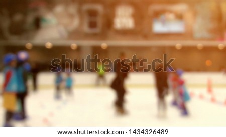 Blurred images, children are practicing ice skating in department stores.