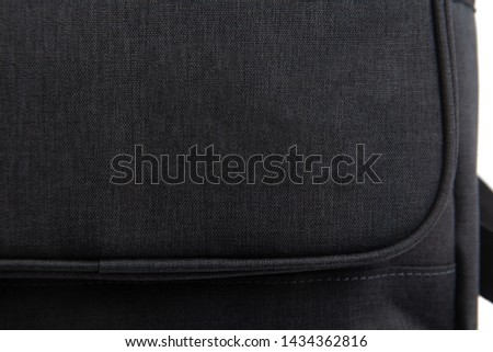 some parts of dark gray backpack on white background